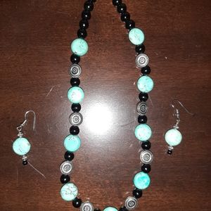 Black and blue beaded necklace and earring set